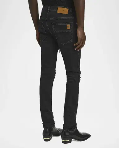 AMIRI Men's Studded Rip and Repair Black Denim Skinny Jeans | Thumbnail 3