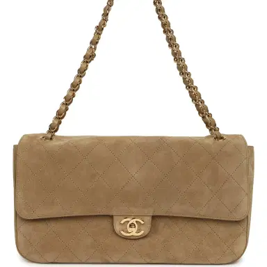 Chanel Chanel Maxi "Souplissimo" Small Flap Bag Dark Beige Suede Gold Hardware | Thumbnail 1 Chanel Chanel Maxi "Souplissimo" Small Flap Bag Dark Beige Suede Gold Hardware | Thumbnail 1