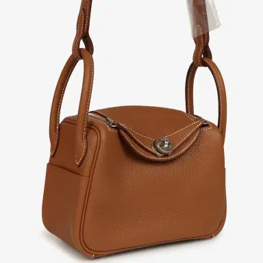 HERMÈS Hermes Mini Lindy II Gold Clemence Palladium Hardware | Thumbnail 2 HERMÈS Hermes Mini Lindy II Gold Clemence Palladium Hardware | Thumbnail 2