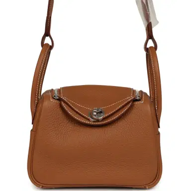 HERMÈS Hermes Mini Lindy II Gold Clemence Palladium Hardware | Thumbnail 1 HERMÈS Hermes Mini Lindy II Gold Clemence Palladium Hardware | Thumbnail 1