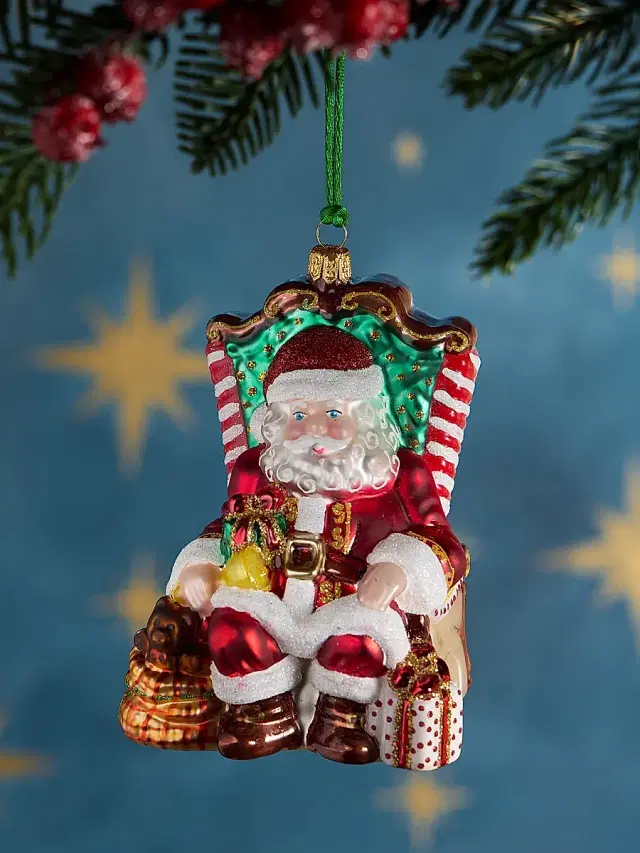 Exclusively Ours Santa In Armchair Glass Ornament