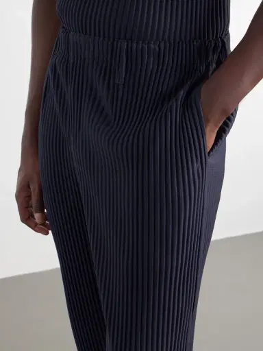 Homme Plissé Issey Miyake Pleated Tapered-Leg Trousers - Men | Thumbnail 5