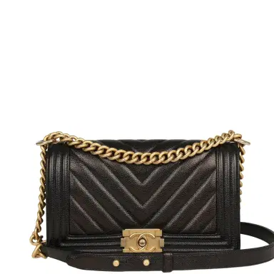 Chanel Pre-owned Chanel Medium Chevron Boy Bag Black Caviar Antique Gold Hardware | Thumbnail 1 Chanel Pre-owned Chanel Medium Chevron Boy Bag Black Caviar Antique Gold Hardware | Thumbnail 1
