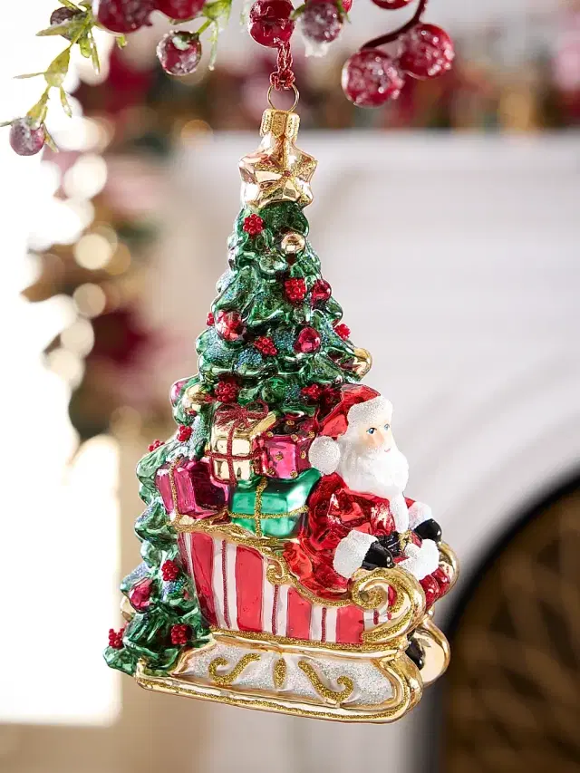 Glassware Art Studio Santa In Sleigh By The Tree Glass Ornament