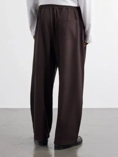 A Kind Of Guise Wewa Wide-Leg Wool Trousers - Men | Thumbnail 4