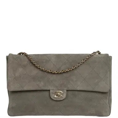 Chanel Chanel Maxi "Souplissimo" Large Flap Bag Dark Grey Suede Gold Hardware | Thumbnail 1 Chanel Chanel Maxi "Souplissimo" Large Flap Bag Dark Grey Suede Gold Hardware | Thumbnail 1
