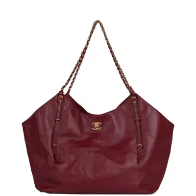 Chanel Chanel Maxi Coco Shopping Bag Burgundy Shiny Calfskin Antique Gold Hardware | Thumbnail 1 Chanel Chanel Maxi Coco Shopping Bag Burgundy Shiny Calfskin Antique Gold Hardware | Thumbnail 1