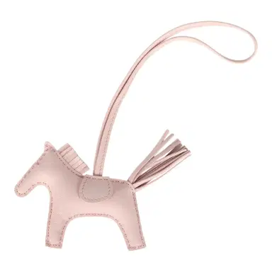 HERMÈS Hermes Rodeo Bag Charm PM Rose Darling Milo Lambskin | Thumbnail 1 HERMÈS Hermes Rodeo Bag Charm PM Rose Darling Milo Lambskin | Thumbnail 1