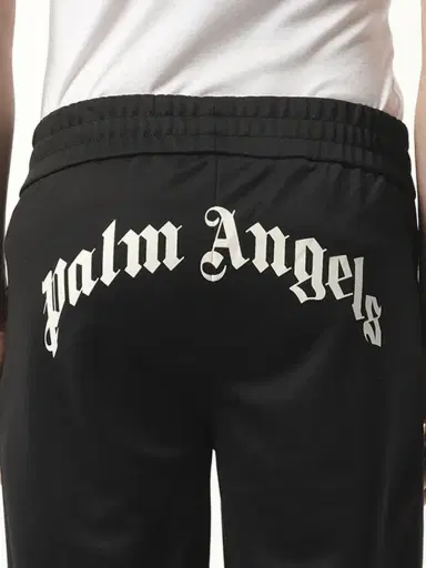 Palm Angels Back Curved Logo Track Pants in Black/off White Black | Thumbnail 2 Palm Angels Back Curved Logo Track Pants in Black/off White Black | Thumbnail 2