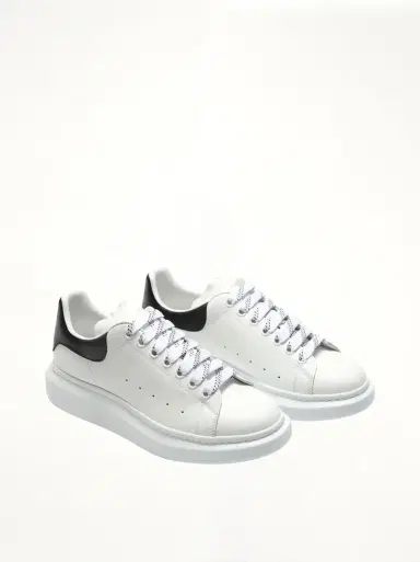 Alexander McQueen Larry Oversized Sneaker in White/black | Thumbnail 3 Alexander McQueen Larry Oversized Sneaker in White/black | Thumbnail 3