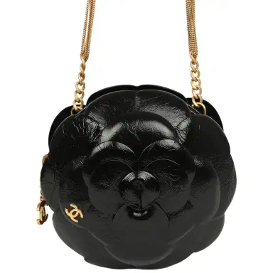 Chanel Chanel Camellia Round Clutch with Chain Black Patent Aged Calfskin Brushed Gold Hardware | Thumbnail 1 Chanel Chanel Camellia Round Clutch with Chain Black Patent Aged Calfskin Brushed Gold Hardware | Thumbnail 1