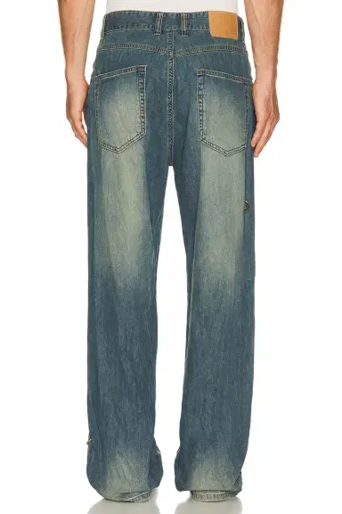 We11Done Piercing Denim Jeans | Thumbnail 4