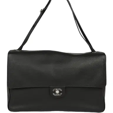 Chanel Chanel Maxi "Souplissimo" Large Flap Bag Black Grained Calfskin Silver Hardware | Thumbnail 1 Chanel Chanel Maxi "Souplissimo" Large Flap Bag Black Grained Calfskin Silver Hardware | Thumbnail 1