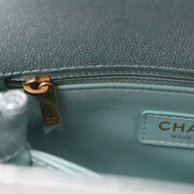Chanel Chanel Small Coco Handle Flap Bag Light Blue Iridescent Caviar Antique Gold Hardware | Thumbnail 9 Chanel Chanel Small Coco Handle Flap Bag Light Blue Iridescent Caviar Antique Gold Hardware | Thumbnail 9