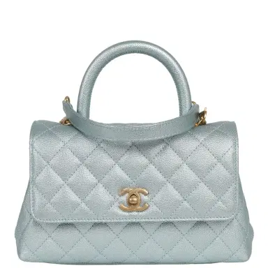 Chanel Chanel Small Coco Handle Flap Bag Light Blue Iridescent Caviar Antique Gold Hardware | Thumbnail 1 Chanel Chanel Small Coco Handle Flap Bag Light Blue Iridescent Caviar Antique Gold Hardware | Thumbnail 1