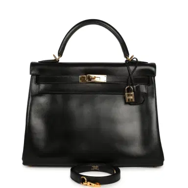 HERMÈS Vintage Hermes Kelly Retourne 32 Black Box Gold Hardware | Thumbnail 1 HERMÈS Vintage Hermes Kelly Retourne 32 Black Box Gold Hardware | Thumbnail 1