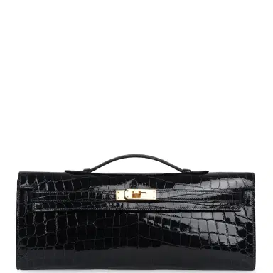 HERMÈS Hermes Kelly Cut Bleu Marine Shiny Niloticus Crocodile Gold Hardware | Thumbnail 1 HERMÈS Hermes Kelly Cut Bleu Marine Shiny Niloticus Crocodile Gold Hardware | Thumbnail 1