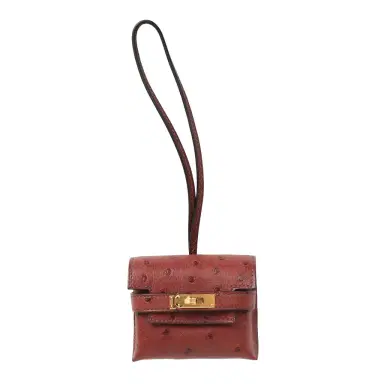 HERMÈS Hermes Kelly Festival Bag Charm Rouge H Ostrich Gold Hardware | Thumbnail 1 HERMÈS Hermes Kelly Festival Bag Charm Rouge H Ostrich Gold Hardware | Thumbnail 1