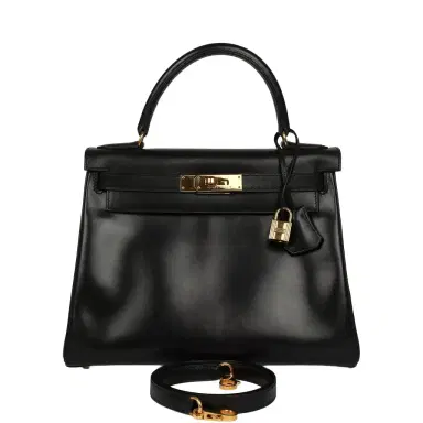 HERMÈS Vintage Hermes Kelly Retourne 28 Black Box Gold Hardware | Thumbnail 1 HERMÈS Vintage Hermes Kelly Retourne 28 Black Box Gold Hardware | Thumbnail 1