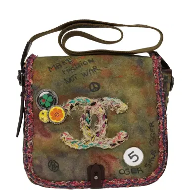 Chanel Pre-owned Chanel Small "On The Pavements" Messenger Bag Dark Khaki, Multicolor Graffiti Canvas Antique Silver Hardware | Thumbnail 1 Chanel Pre-owned Chanel Small "On The Pavements" Messenger Bag Dark Khaki, Multicolor Graffiti Canvas Antique Silver Hardware | Thumbnail 1
