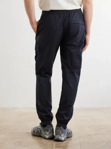 Stone Island Tapered Cotton-Blend Trousers - Men | Thumbnail 4 Stone Island Tapered Cotton-Blend Trousers - Men | Thumbnail 4