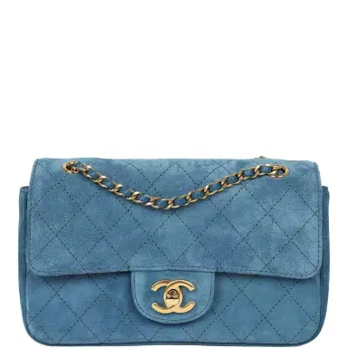 Chanel Chanel Mini "Souplissimo" Flap Bag Blue Suede Gold Hardware | Thumbnail 1 Chanel Chanel Mini "Souplissimo" Flap Bag Blue Suede Gold Hardware | Thumbnail 1