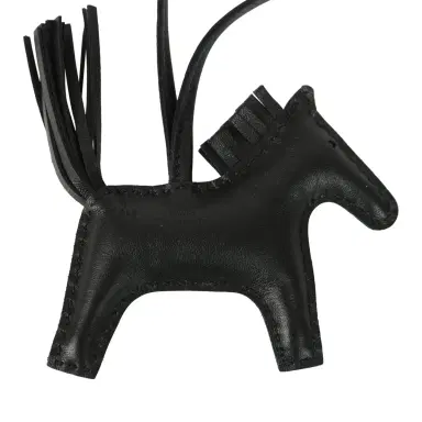 HERMÈS Hermes Rodeo Rock Bag Charm PM Black Milo Lambskin Gold Hardware | Thumbnail 5 HERMÈS Hermes Rodeo Rock Bag Charm PM Black Milo Lambskin Gold Hardware | Thumbnail 5