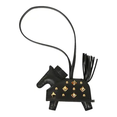 HERMÈS Hermes Rodeo Rock Bag Charm PM Black Milo Lambskin Gold Hardware | Thumbnail 1 HERMÈS Hermes Rodeo Rock Bag Charm PM Black Milo Lambskin Gold Hardware | Thumbnail 1