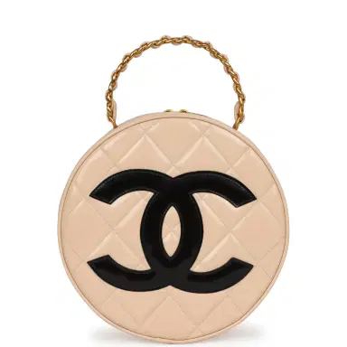 Chanel Vintage Chanel Round Vanity Bag Beige and Black Patent Leather Antique Gold Hardware | Thumbnail 1 Chanel Vintage Chanel Round Vanity Bag Beige and Black Patent Leather Antique Gold Hardware | Thumbnail 1