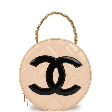 Chanel Vintage Chanel Round Vanity Bag Beige and Black Patent Leather Antique Gold Hardware | Thumbnail 1 Chanel Vintage Chanel Round Vanity Bag Beige and Black Patent Leather Antique Gold Hardware | Thumbnail 1