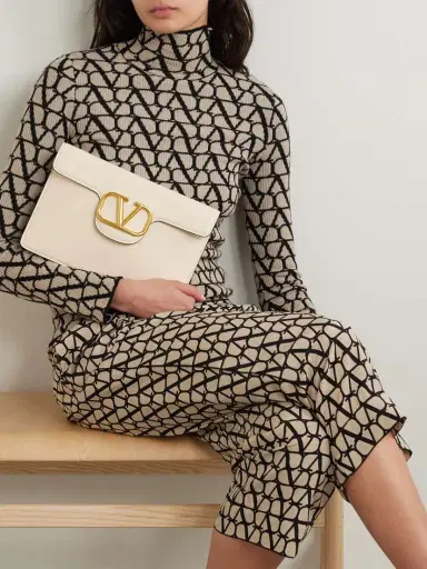 Valentino Garavani Locò Leather Clutch | Thumbnail 2 Valentino Garavani Locò Leather Clutch | Thumbnail 2