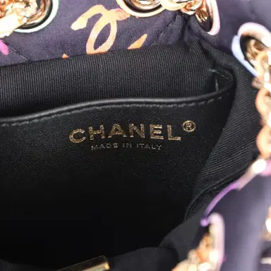 Chanel Chanel Medium CC Drawstring Backpack Multicolored Printed Fabric Light Gold Hardware | Thumbnail 10 Chanel Chanel Medium CC Drawstring Backpack Multicolored Printed Fabric Light Gold Hardware | Thumbnail 10