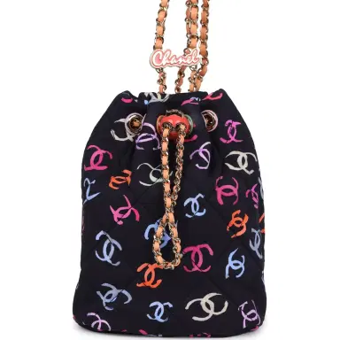 Chanel Chanel Medium CC Drawstring Backpack Multicolored Printed Fabric Light Gold Hardware | Thumbnail 1 Chanel Chanel Medium CC Drawstring Backpack Multicolored Printed Fabric Light Gold Hardware | Thumbnail 1