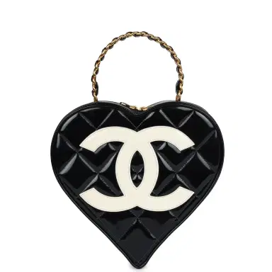 Chanel Vintage Chanel Heart Vanity Bag Black and White Patent Antique Gold Hardware | Thumbnail 1 Chanel Vintage Chanel Heart Vanity Bag Black and White Patent Antique Gold Hardware | Thumbnail 1