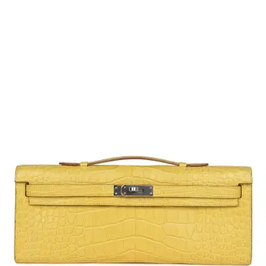 HERMÈS Hermes Kelly Cut Mimosa Matte Alligator Palladium Hardware | Thumbnail 1 HERMÈS Hermes Kelly Cut Mimosa Matte Alligator Palladium Hardware | Thumbnail 1