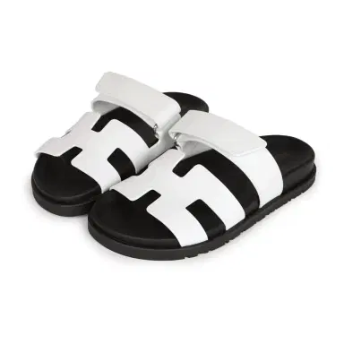 HERMÈS Hermes Chypre Sandals White Palladium Hardware 35.5 EU | Thumbnail 1 HERMÈS Hermes Chypre Sandals White Palladium Hardware 35.5 EU | Thumbnail 1
