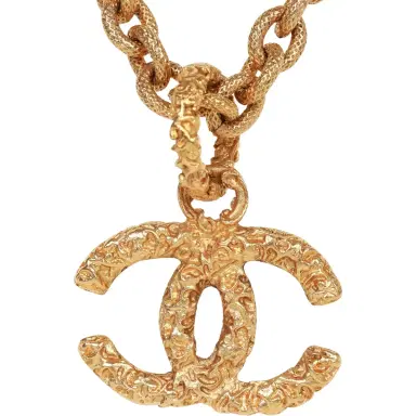 Chanel Vintage Chanel Gold Plated Lava CC Pendant Necklace | Thumbnail 2 Chanel Vintage Chanel Gold Plated Lava CC Pendant Necklace | Thumbnail 2