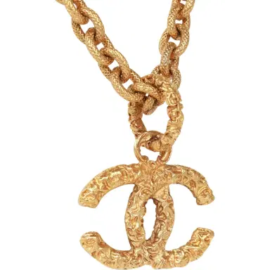 Chanel Vintage Chanel Gold Plated Lava CC Pendant Necklace | Thumbnail 3 Chanel Vintage Chanel Gold Plated Lava CC Pendant Necklace | Thumbnail 3