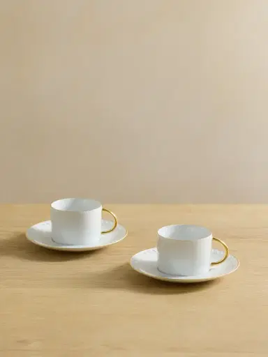 L'Objet Neptune Set Of Two Gold-plated Porcelain Tea Cups And Saucers | Thumbnail 1 L'Objet Neptune Set Of Two Gold-plated Porcelain Tea Cups And Saucers | Thumbnail 1