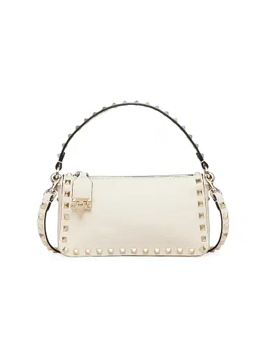 Valentino Garavani Women's Rockstud Grainy Calfskin Crossbody Bag - Light | Thumbnail 1 Valentino Garavani Women's Rockstud Grainy Calfskin Crossbody Bag - Light | Thumbnail 1