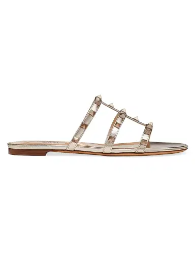 Valentino Garavani Women's Rockstud Flat Metallic Nappa Slide Sandals | Thumbnail 1 Valentino Garavani Women's Rockstud Flat Metallic Nappa Slide Sandals | Thumbnail 1
