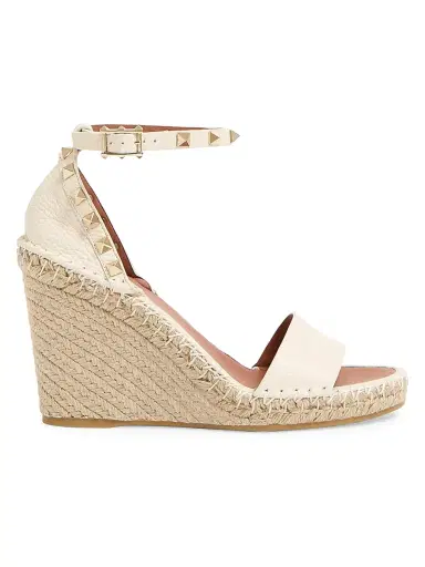 Valentino Garavani Women's Double Rockstud Grainy Calfskin Wedges 105MM - Light Ivory - Size 12 | Thumbnail 1 Valentino Garavani Women's Double Rockstud Grainy Calfskin Wedges 105MM - Light Ivory - Size 12 | Thumbnail 1