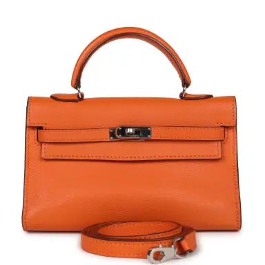 HERMÈS Pre-owned Hermes Micro Kelly 15 Orange Swift Palladium Hardware | Thumbnail 1 HERMÈS Pre-owned Hermes Micro Kelly 15 Orange Swift Palladium Hardware | Thumbnail 1