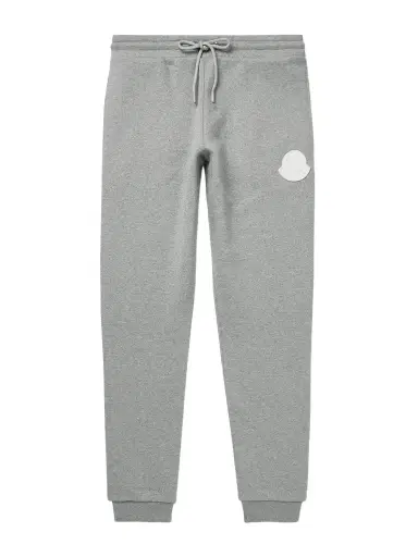 Moncler Slim-Fit Tapered Logo-Appliquéd Cotton-Jersey Sweatpants - Men | Thumbnail 1 Moncler Slim-Fit Tapered Logo-Appliquéd Cotton-Jersey Sweatpants - Men | Thumbnail 1