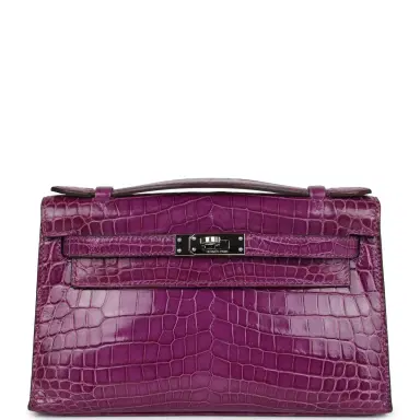 HERMÈS Pre-owned Hermes Kelly Pochette Violet Shiny Niloticus Crocodile Palladium Hardware | Thumbnail 1 HERMÈS Pre-owned Hermes Kelly Pochette Violet Shiny Niloticus Crocodile Palladium Hardware | Thumbnail 1