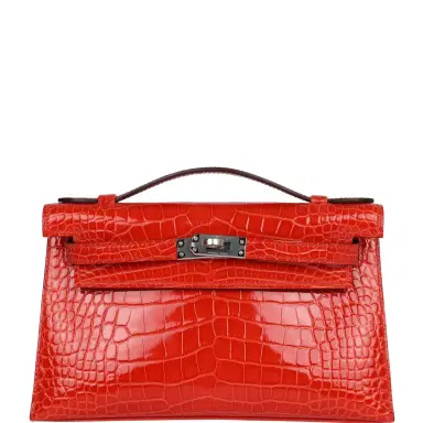 HERMÈS Hermes Kelly Pochette Orange Poppy Shiny Alligator Mississippiensis Palladium Hardware | Thumbnail 1 HERMÈS Hermes Kelly Pochette Orange Poppy Shiny Alligator Mississippiensis Palladium Hardware | Thumbnail 1