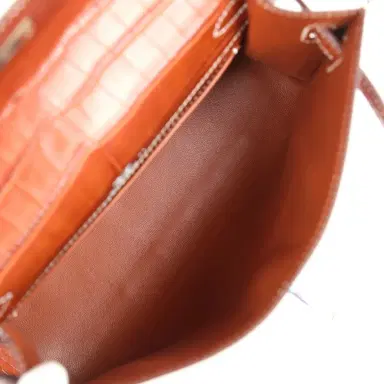 HERMÈS Pre-owned Hermes Kelly Pochette Fauve Matte Niloticus Crocodile Ruthenium Hardware | Thumbnail 8 HERMÈS Pre-owned Hermes Kelly Pochette Fauve Matte Niloticus Crocodile Ruthenium Hardware | Thumbnail 8