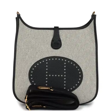 HERMÈS Hermes Evelyne III PM Black/Ecru Clemence and Toile Gold Hardware | Thumbnail 1 HERMÈS Hermes Evelyne III PM Black/Ecru Clemence and Toile Gold Hardware | Thumbnail 1