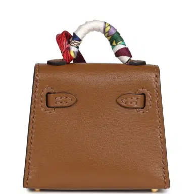 HERMÈS Hermes Mini Kelly Twilly Bag Charm Alezan Tadelakt Gold Hardware | Thumbnail 4 HERMÈS Hermes Mini Kelly Twilly Bag Charm Alezan Tadelakt Gold Hardware | Thumbnail 4