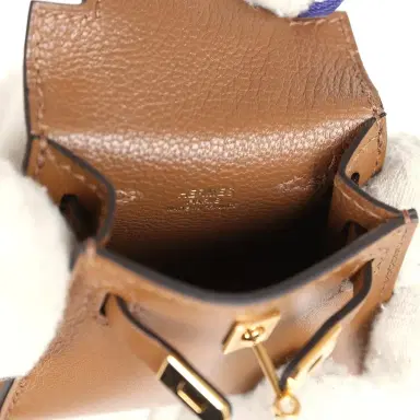 HERMÈS Hermes Mini Kelly Twilly Bag Charm Alezan Tadelakt Gold Hardware | Thumbnail 7 HERMÈS Hermes Mini Kelly Twilly Bag Charm Alezan Tadelakt Gold Hardware | Thumbnail 7
